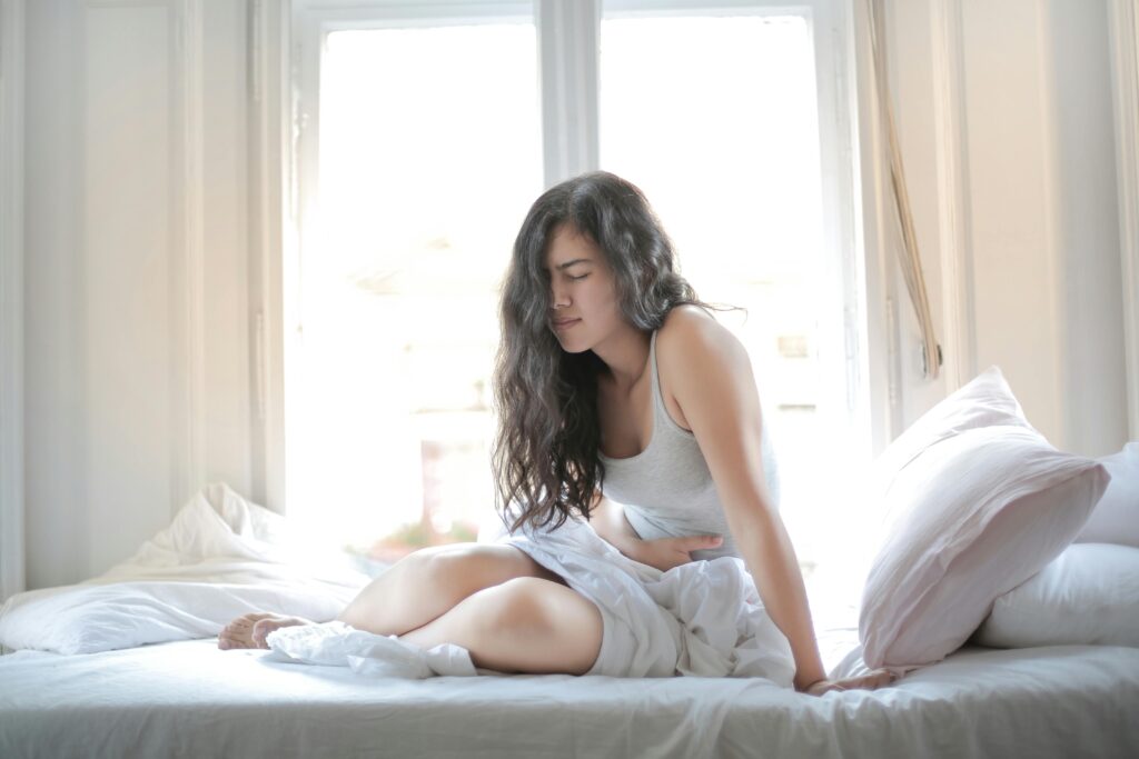 https://www.pexels.com/photo/woman-suffering-from-a-stomach-pain-3807733/